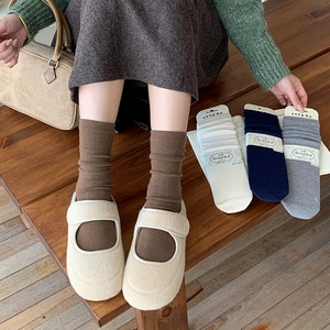 Silk wool crew socks for women featuring warm waffle texture in various earthy tones
