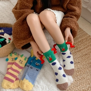 Funny monster coral fleece socks for women in colorful cartoon patterns for winter warmth
