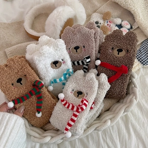 5-pack cute bear coral fleece winter socks with thick warm fuzzy material in a basket