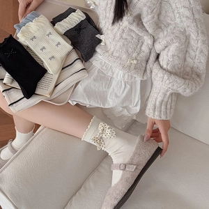 Chic ballet-style mid-calf socks with polka dot bows and pearls in a cream white set
