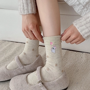 Cute embroidered rabbit socks in oatmeal with floral patterns and heart balloon detail