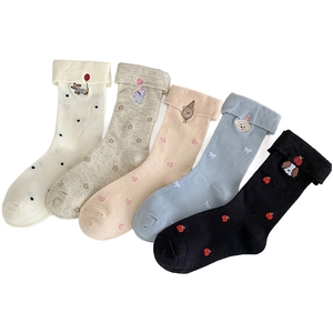 Five pairs of cute cartoon animal embroidered crew socks with stylish folded cuffs