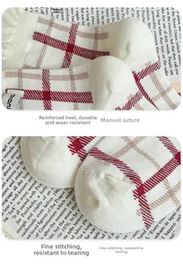 Detailed macro view of vintage red plaid cotton socks with reinforced heel and toe seams