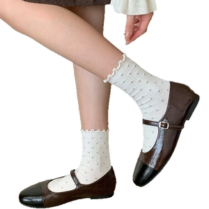 Ballerines Mary Jane classiques bicolores marron et noir avec finition cuir brillant