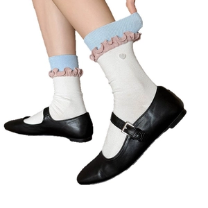 Women's sweet heart accent crew socks with pink ruffled edges and blue ribbed cuffs