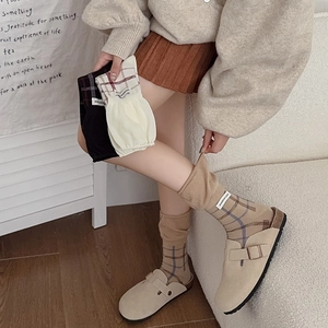 Japanese style retro plaid crew socks for women featuring elastic cuffs and woven labels