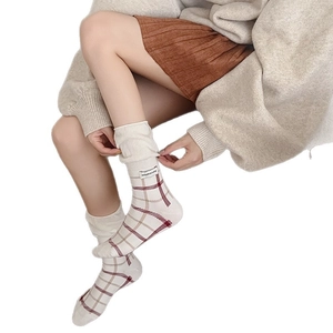Plaid knitted crew socks in warm beige and reddish brown with MMDR label for women