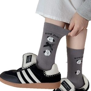 Grey crew socks for women featuring cute dog embroidery and a black satin bow accent