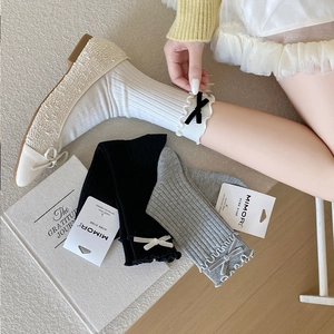 Ballet style ruffled crew socks for women featuring velvet bows in black white and grey