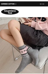 Detail of combed cotton mid-tube socks with pink and grey pattern and seamless toe finish