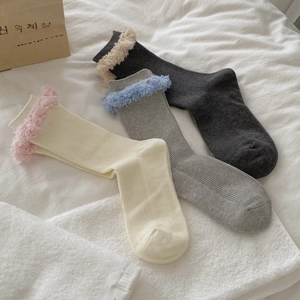 Three pairs of plush lace trim knit socks in grey and cream with soft ribbed texture
