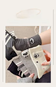 Detail of cute flocked sheep cartoon patterns and high-quality embroidery on cotton socks