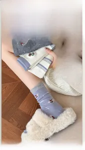 Detailed embroidery of cute koala and bear patterns on warm wool knit socks