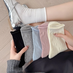 Five-pack ballet style crew socks with 3D bow jacquard pattern and frilly cuffs