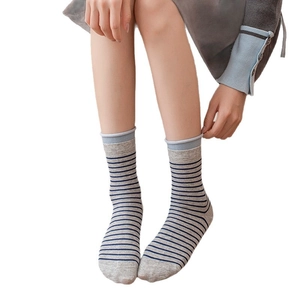 Classic gray striped mid-calf socks with blue rolled cuffs and knitted cotton texture