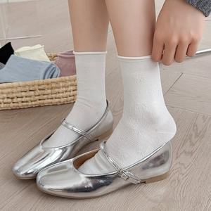 Silver Mary Jane shoes with white bow bowknot mid-calf socks for a balletcore look