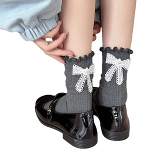Grey ballet core crew socks with white lace bow, pearl detail and ruffled edges