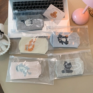 Five pairs of cute cartoon cat socks in various pastel colors with zip packaging