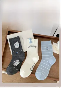 Three-pack cotton mid-calf socks with cute cartoon cat patterns and striped designs