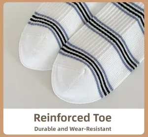 Detail shot of reinforced toe seam on striped cotton socks showing durable stitching
