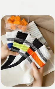 Close-up of breathable mesh cotton crew socks with vibrant classic striped patterns