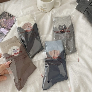 Set of four cartoon animal pattern crew socks in gray blue coffee and white colors