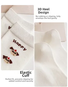 Detail of white cotton socks with ribbed elastic cuffs and cute cartoon puppy pattern