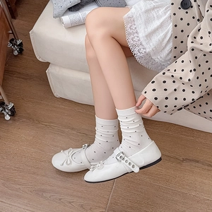 French retro white Mary Jane flats with bow detail and polka dot socks for women
