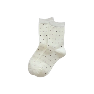 Japanese style beige crew socks with dark polka dots featuring elastic ribbed cuffs