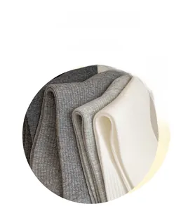 Detailed macro view of soft ribbed texture and four gradient shades of gray cotton socks