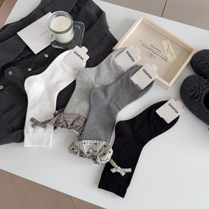 Lace ruffle ankle socks with plaid bows in grey, white, and black colors