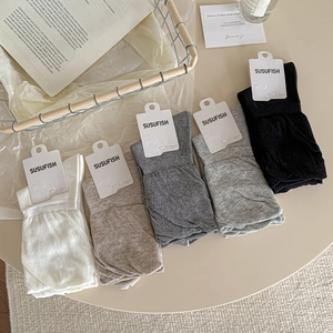 Five pairs of ballet-style cotton ribbed socks in assorted neutral colors for women