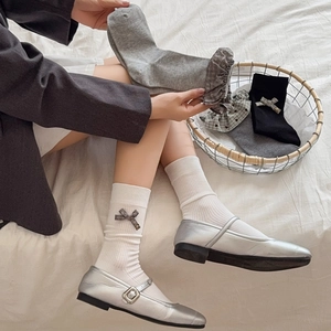 Lace ruffle crew socks with bow detail in Korean style, shown with Mary Jane shoes
