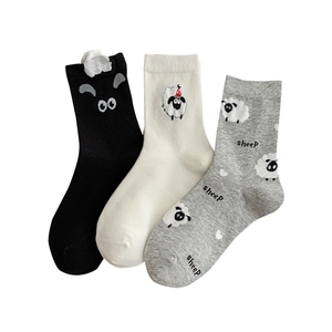 Three pairs of cute 3D cartoon sheep crew socks in black, white and grey colors