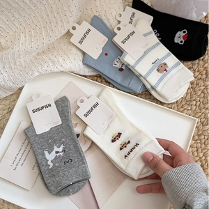 Set of cute cartoon animal mid-calf socks for women featuring puppy and cat embroidery
