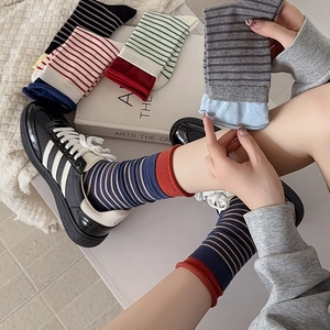 Classic striped crew socks in multiple colorways for women with ribbed knitted cuffs