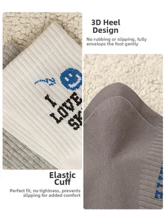 Detail of cotton crew socks showing the elastic cuff, 3D heel, and smiley face embroidery