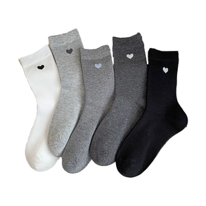Ribbed mid-calf cotton socks set in five colors featuring minimalist heart embroidery