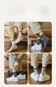 Detailed view of men's ribbed mid-calf socks featuring exquisite animal embroidery patterns