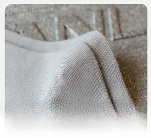 Close-up of the 3D ergonomic heel design on breathable grey knitted sports socks