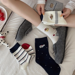 Chaussettes femme en coton bleu marine avec motifs chiots et rayures style collège