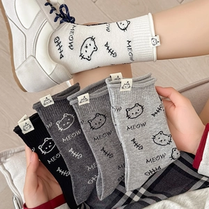 Cute cartoon cat crew socks set in various shades of grey and white with knit details