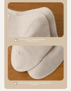Macro view of 3D knit heel and flat seam toe on beige cotton mid-cut athletic socks