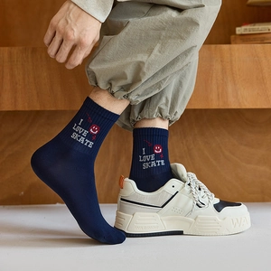 Blue mid-calf socks with I LOVE SKATE print and red smiley face for trendy teenage boys