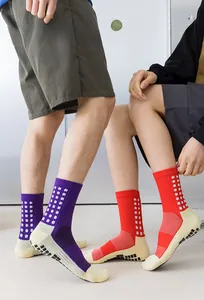 Detail of professional soccer socks with anti-slip silicone grip on the sole and breathable mesh