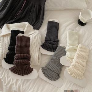 Jambières tricotées pour femmes en six couleurs avec texture côtelée et bords ondulés