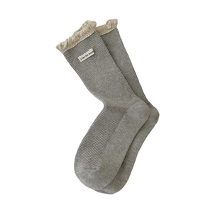 Grey lace trim crew socks with ribbed texture and 'Own the moment' woven label detail