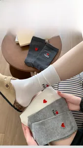 Detailed view of heart embroidered cotton socks with compact anti-pilling structure
