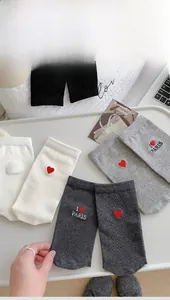 Detail of red heart and I Love Paris embroidery on cotton blend crew socks set