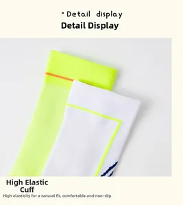 Detail view of high-elasticity ribbed cuffs on neon and white cycling sport socks